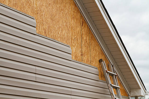 Professional Emergency Siding Repair technician working in Calhan, CO